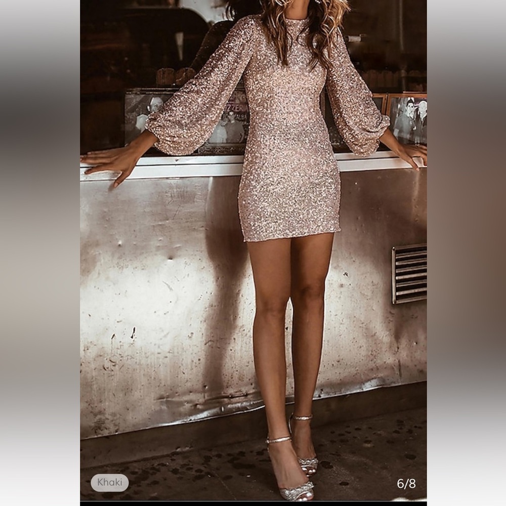 Beautiful sequin dress. Rose gold color. Large but fits like a small.